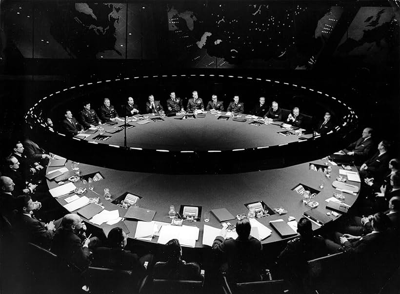 Peter Sellers, George C. Scott, Peter Evans, Robert O'Neil, Jeff Silk, Roy Stephens, Gordon Tanner, Reg Thomason, Peter Roy, Victor Harrington, Joe Phelps, and George Holdcroft in Dr. Strangelove or: How I Learned to Stop Worrying and Love the Bomb (1964)