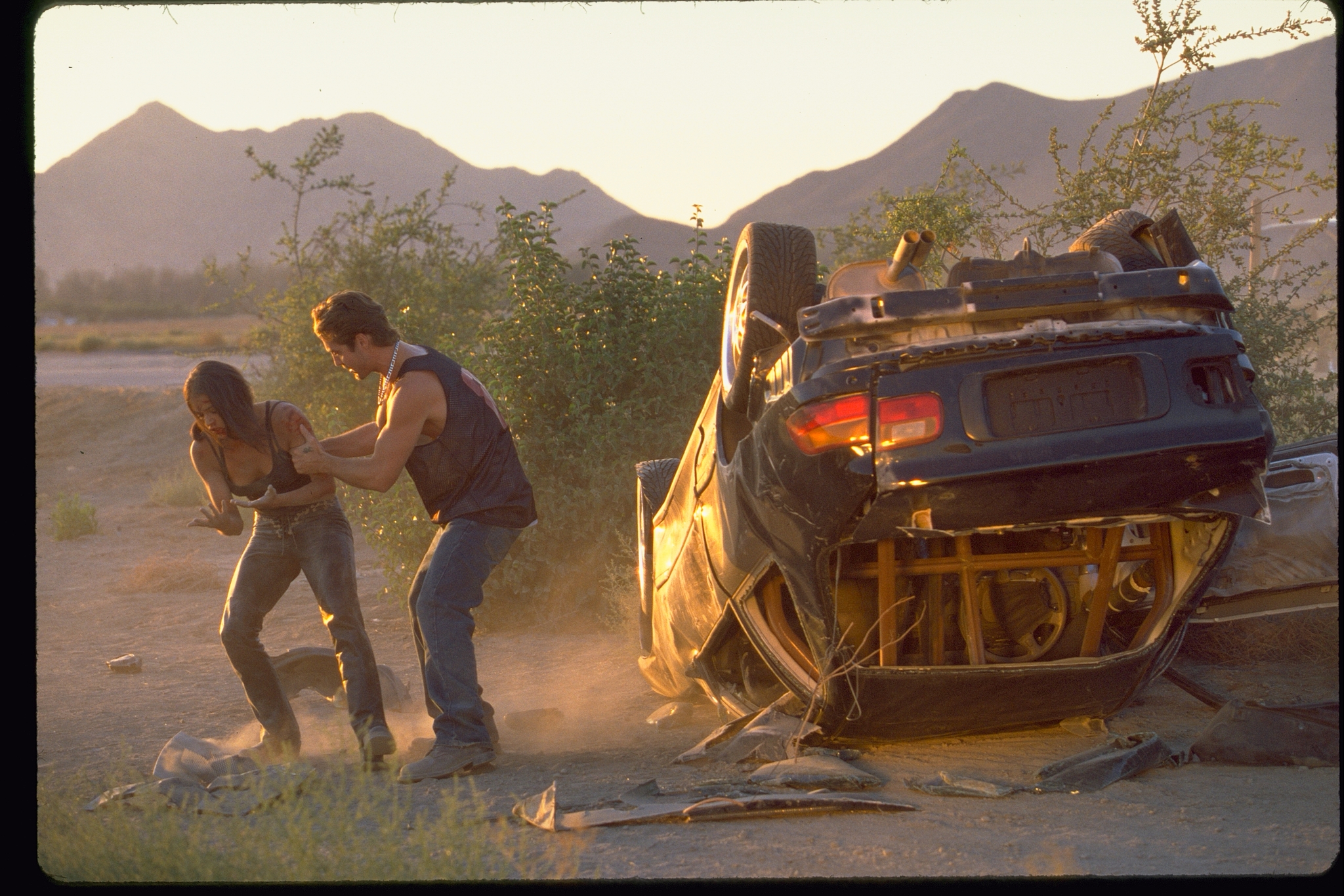 Michelle Rodriguez and Johnny Strong in The Fast and the Furious (2001)