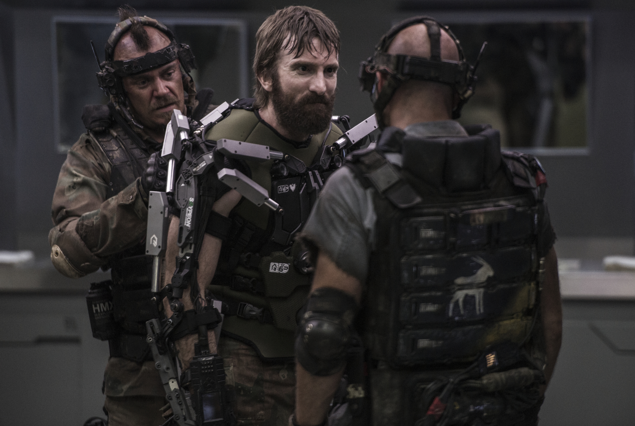 Josh Blacker, Brandon Auret, and Sharlto Copley in Elysium (2013)