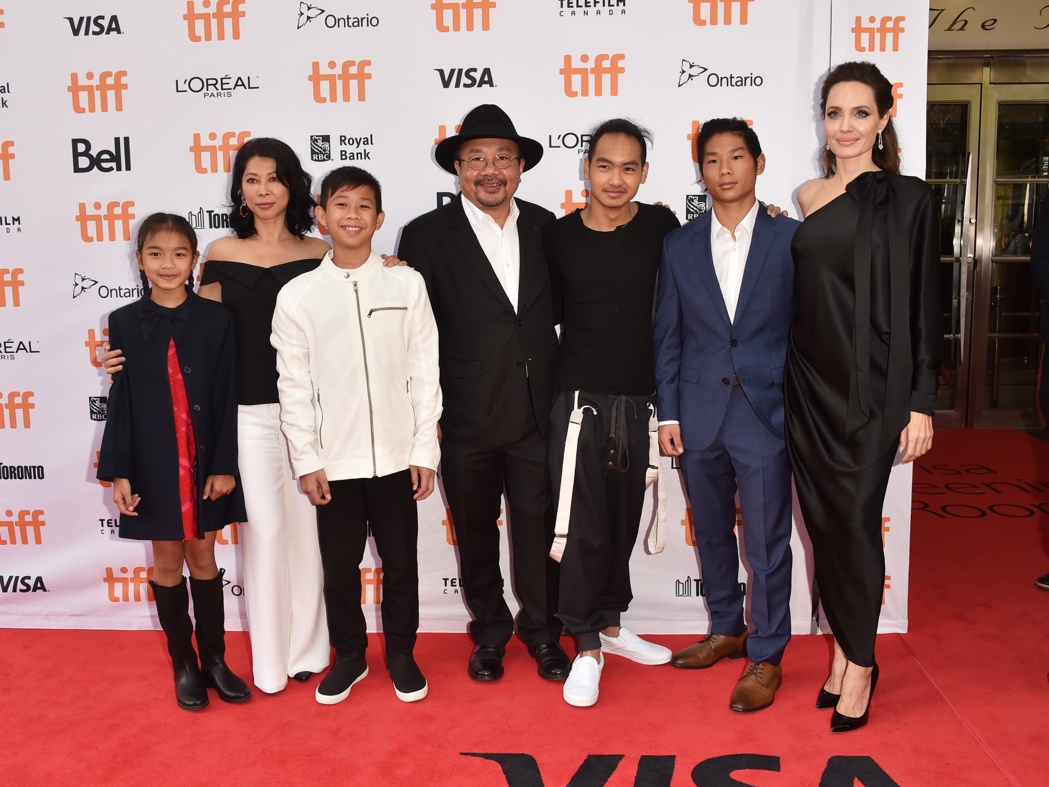 Angelina Jolie, Rithy Panh, Maddox Jolie-Pitt, Pax Jolie-Pitt, Loung Ung, Sareum Srey Moch, and Mun Kimhak at an event for First They Killed My Father (2017)