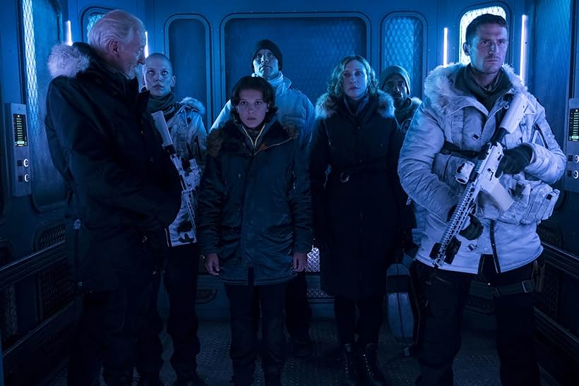 Charles Dance, Vera Farmiga, Zac Zedalis, Jonathan Howard, Joshua Leary, Millie Bobby Brown, and Tracie Garrison in Godzilla: King of the Monsters (2019)