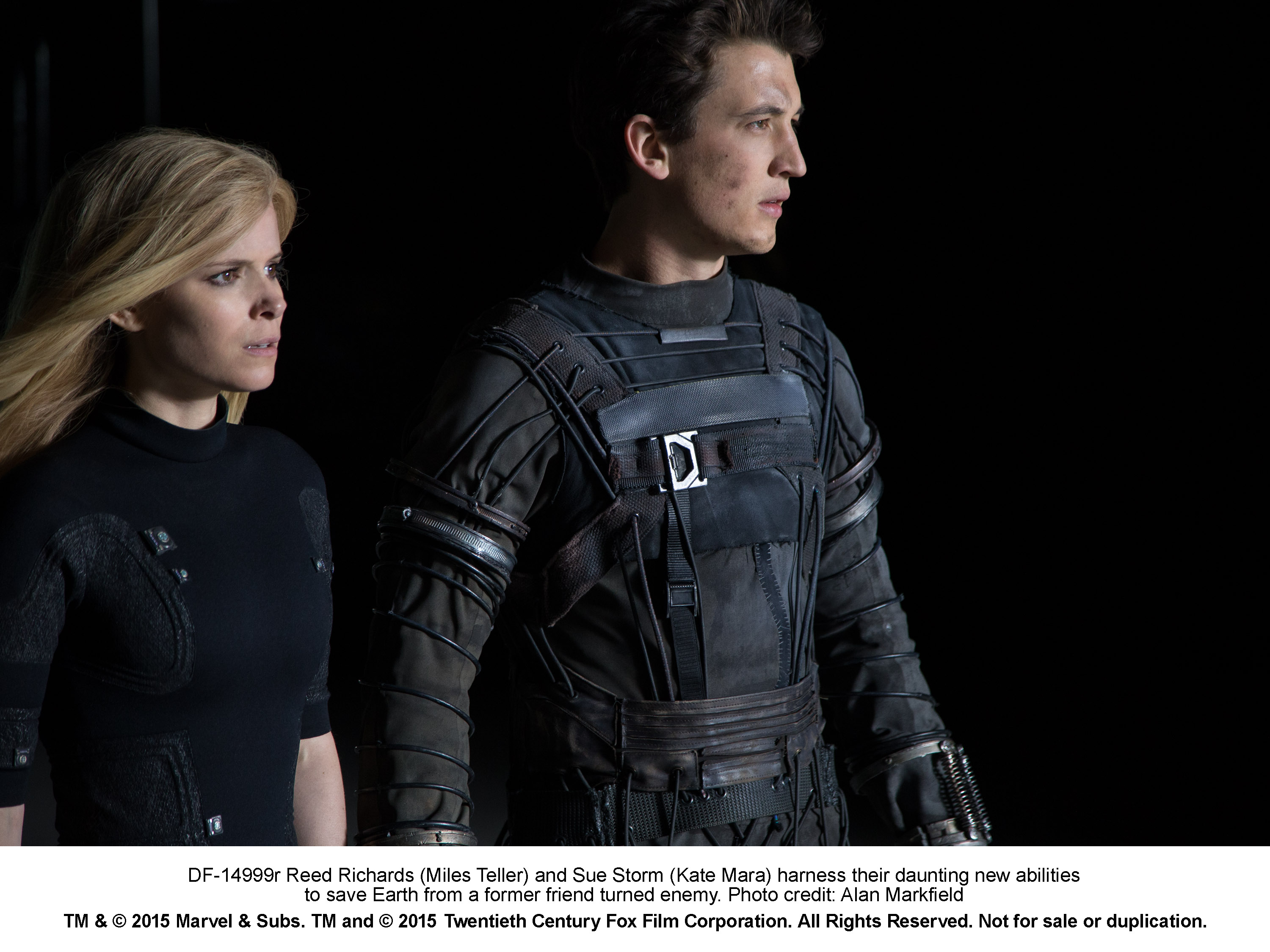 Kate Mara and Miles Teller in Fantastic Four (2015)