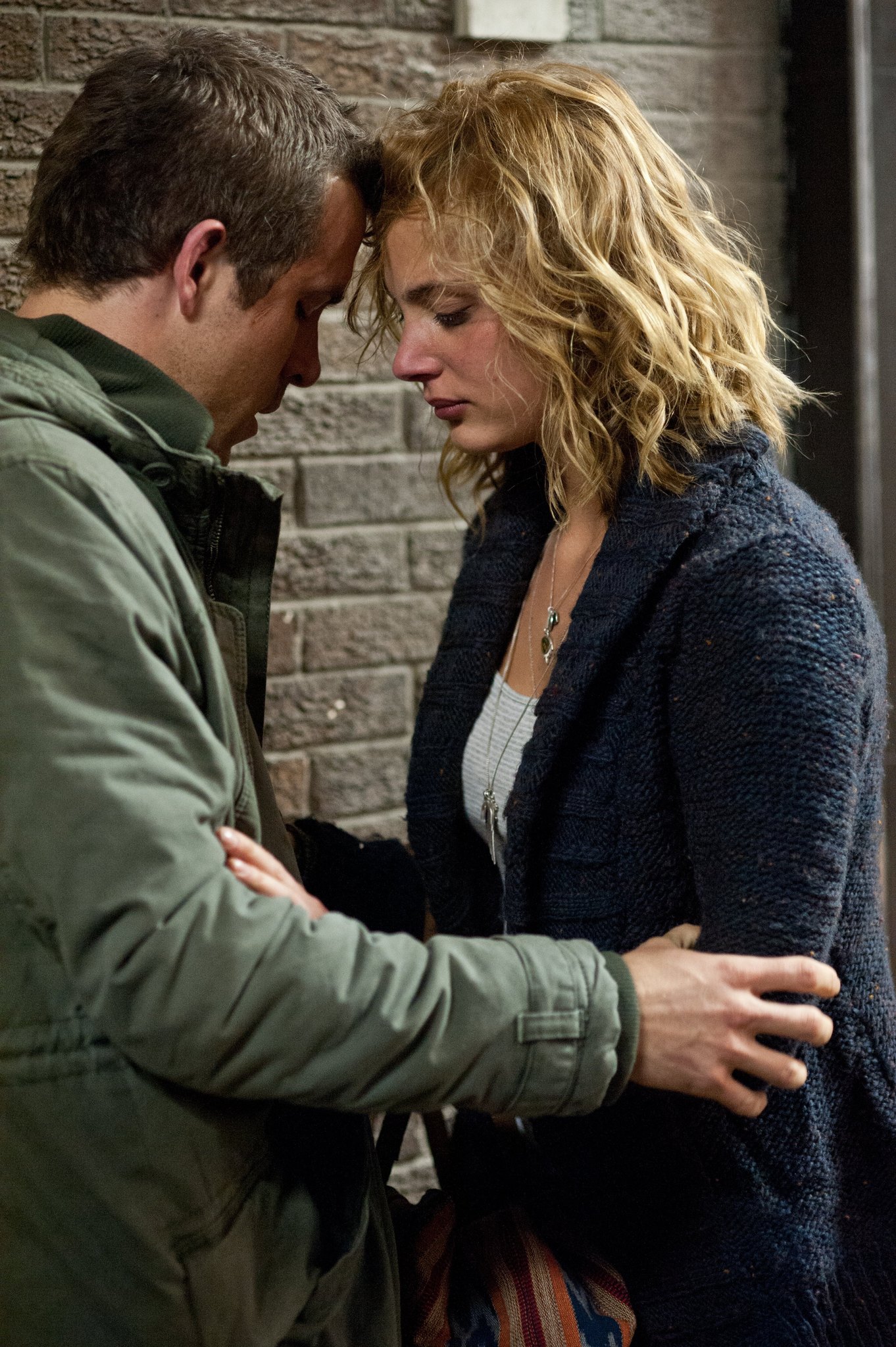 Ryan Reynolds and Nora Arnezeder in Safe House (2012)