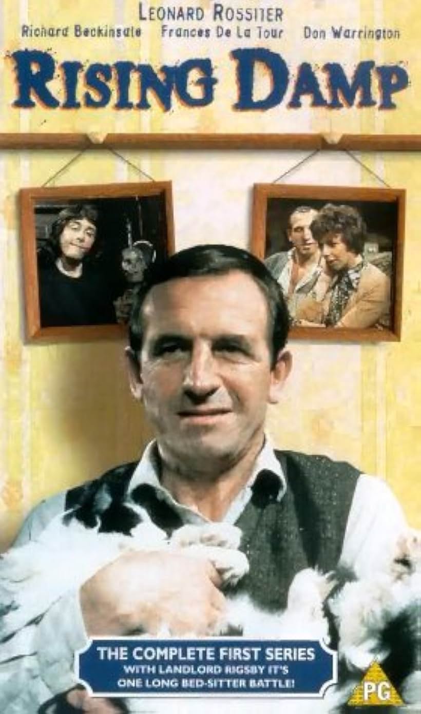 Richard Beckinsale, Frances de la Tour, and Leonard Rossiter in Rising Damp (1974)