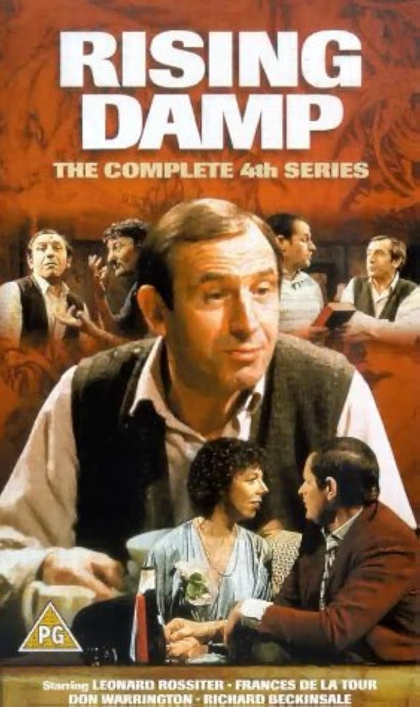 Frances de la Tour, Peter Jeffrey, and Leonard Rossiter in Rising Damp (1974)