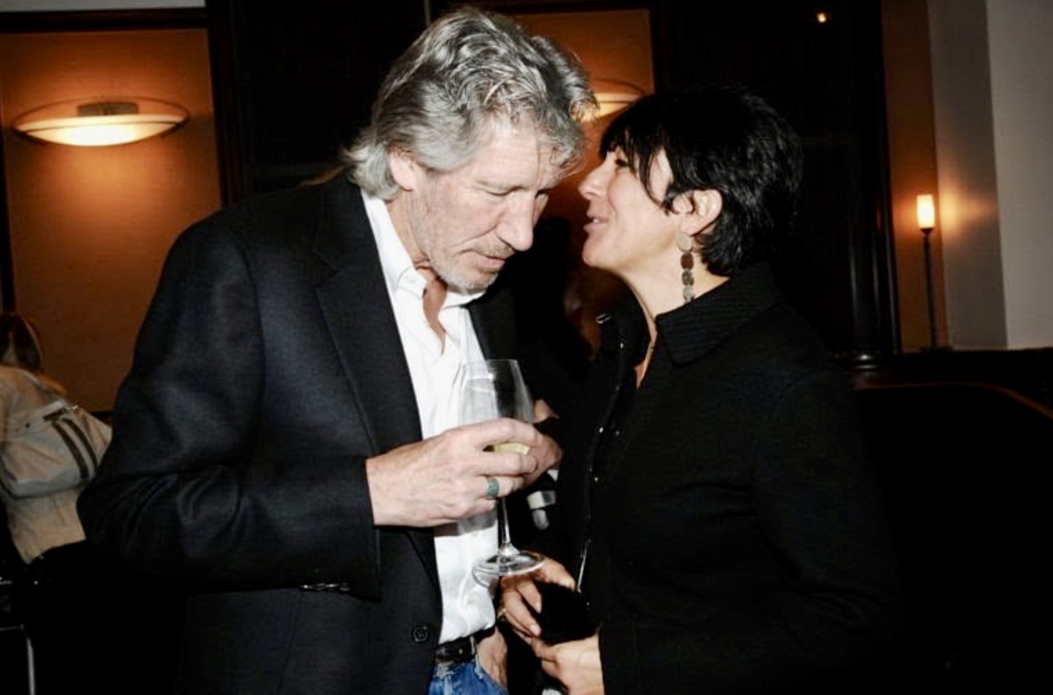 Roger Waters and Ghislaine Maxwell in Ghislaine Maxwell: Filthy Rich (2022)