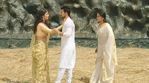 Sudha Chandran, Mouni Roy, and Arjun Bijlani in Naagin (2015)