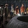 Wyatt Oleff, Jeremy Ray Taylor, Jaeden Martell, Finn Wolfhard, Sophia Lillis, Jack Dylan Grazer, and Chosen Jacobs in It (2017)