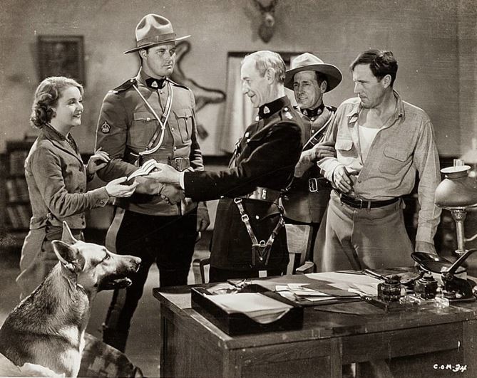 Francis X. Bushman Jr., George Chesebro, Earl Dwire, Robert Walker, Lois Wilde, and Rin Tin Tin Jr. in Caryl of the Mountains (1936)