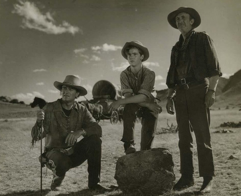 John Wayne, Walter Brennan, and Mickey Kuhn in Red River (1948)