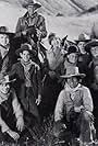 Robert Carradine, Mitch Brown, Jim Davis, Diana Douglas, Moses Gunn, Clint Howard, Sean Kelly, Kerry MacLane, A Martinez, and Clay O'Brien in The Cowboys (1974)