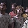 Wyatt Oleff, Jeremy Ray Taylor, Jaeden Martell, Finn Wolfhard, Sophia Lillis, Jack Dylan Grazer, and Chosen Jacobs in It (2017)