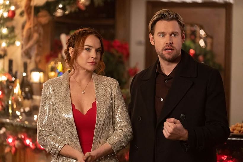 Lindsay Lohan and Chord Overstreet in Falling for Christmas (2022)