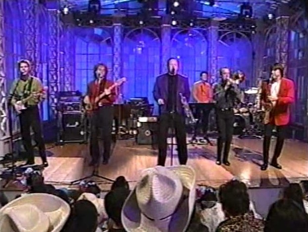 Bill Champlin, Robert Lamm, Lee Loughnane, Walter Parazaider, Chicago, Tris Imboden, James Pankow, and Jason Scheff in The Roseanne Show (1997)