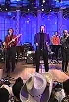 Bill Champlin, Robert Lamm, Lee Loughnane, Walter Parazaider, Chicago, Tris Imboden, James Pankow, and Jason Scheff in The Roseanne Show (1997)