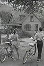 Carole Ann Campbell and Tommy Kirk in The Hardy Boys: The Mystery of the Ghost Farm (1957)