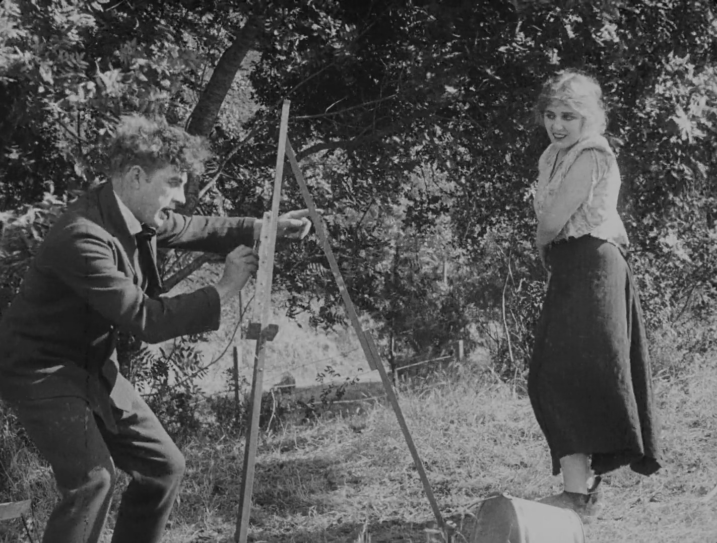 Lloyd Bacon and Edna Purviance in The Vagabond (1916)