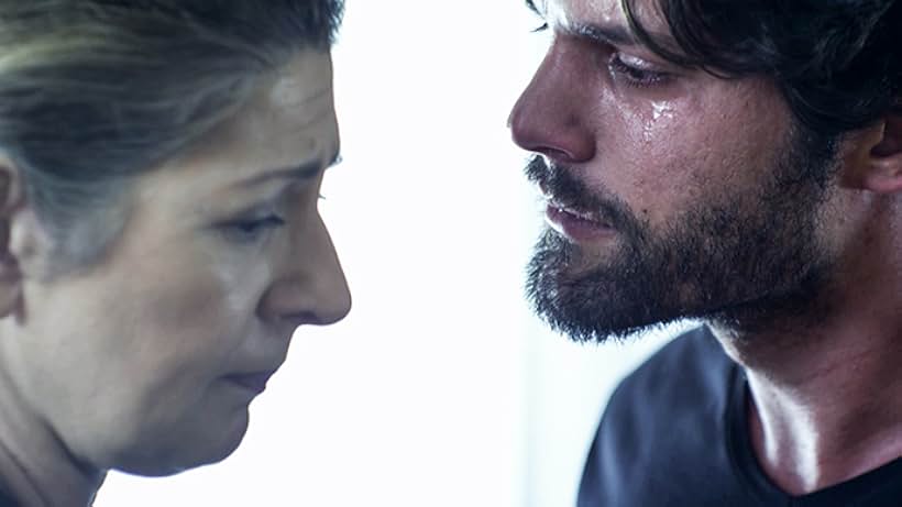 Maria Georgiadou and Nicolas Bravos in Eglima kai pathos (2018)