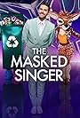 Natalie Appleton, Stephen Hendry, and Joel Dommett in The Masked Singer UK (2020)