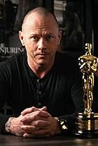 Justin Raleigh poses with his Academy Award.