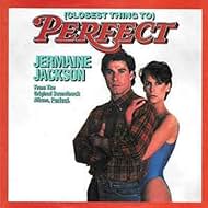 Jamie Lee Curtis and John Travolta in Jermaine Jackson: (The Closest Thing To) Perfect (1985)