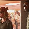 Emily Beecham and Damson Idris in Outside the Wire (2021)