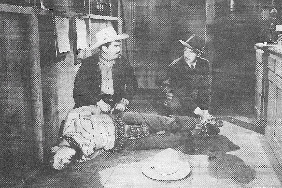 Roy Rogers, Jack O'Shea, and Bradley Page in Sons of the Pioneers (1942)