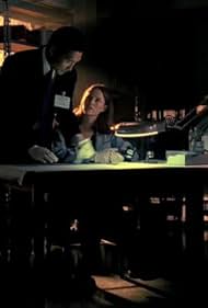 Daniel Dae Kim and Jorja Fox in CSI: Crime Scene Investigation (2000)