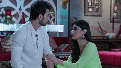 Mouni Roy and Arjun Bijlani in Naagin (2015)