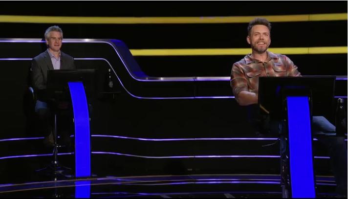 Joel McHale in Who Wants to Be a Millionaire (2002)