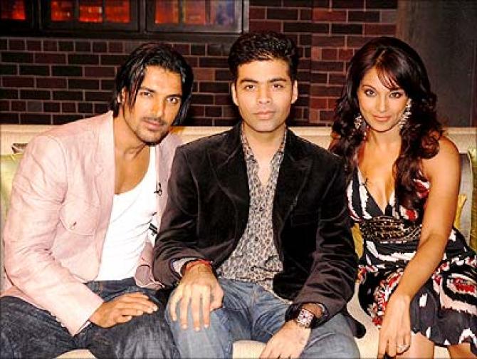 Bipasha Basu, Karan Johar, and John Abraham in Koffee with Karan (2004)