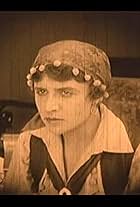 Edna Holland in The Masked Rider (1919)