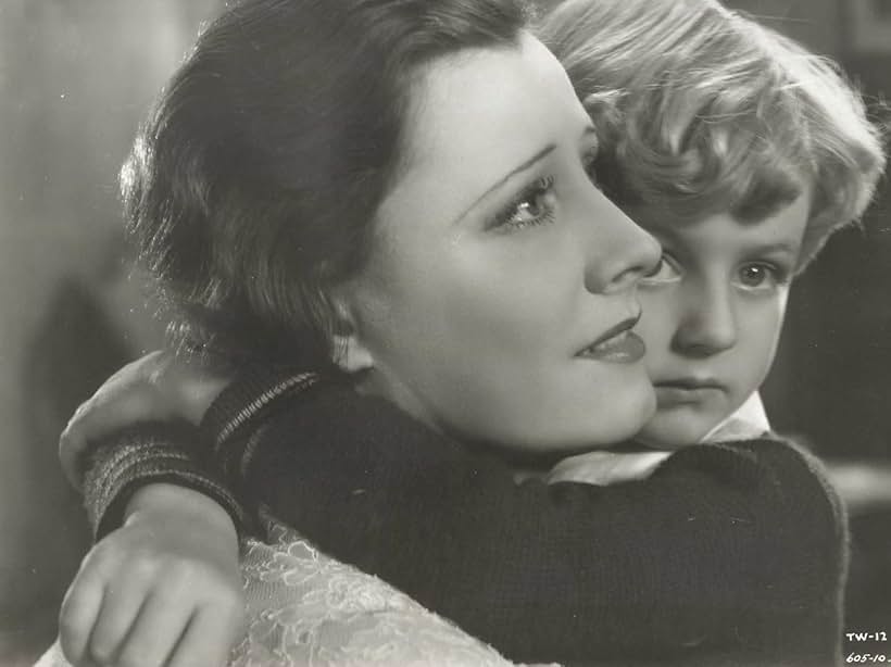 Irene Dunne and Wally Albright in Thirteen Women (1932)