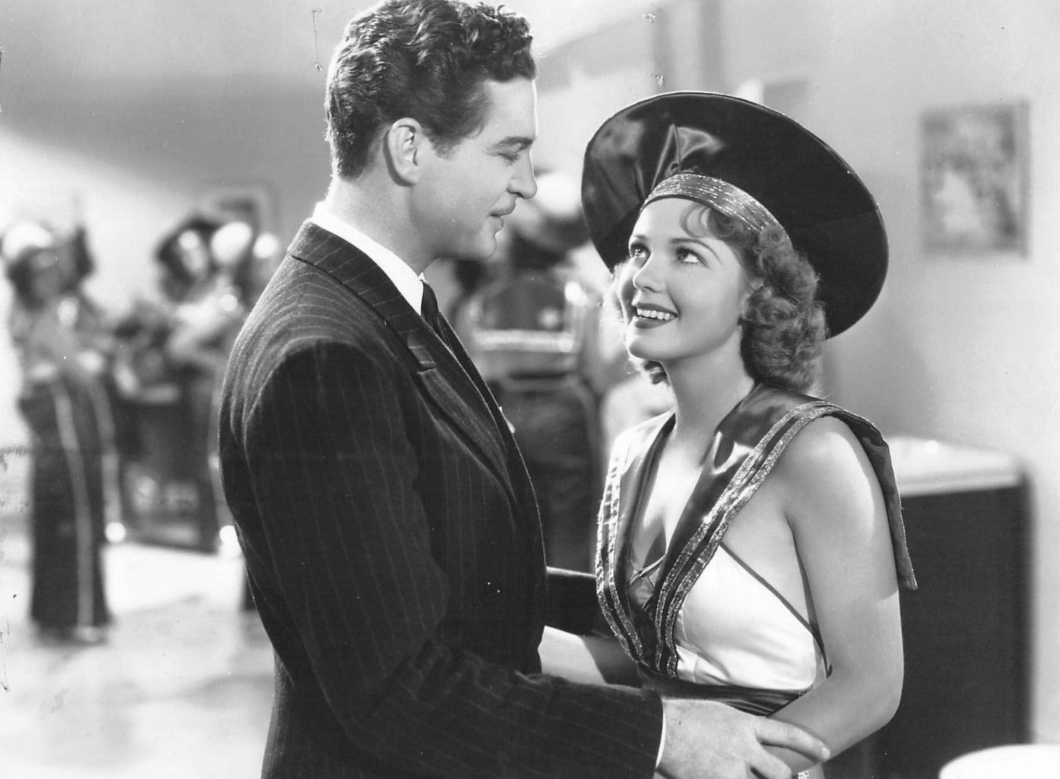 Jean Rogers and Michael Whalen in While New York Sleeps (1938)