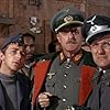 Richard Dawson, John Dehner, Ivan Dixon, and Werner Klemperer in Hogan's Heroes (1965)