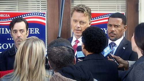 Peter Parros and John Schneider in The Haves and the Have Nots (2013)