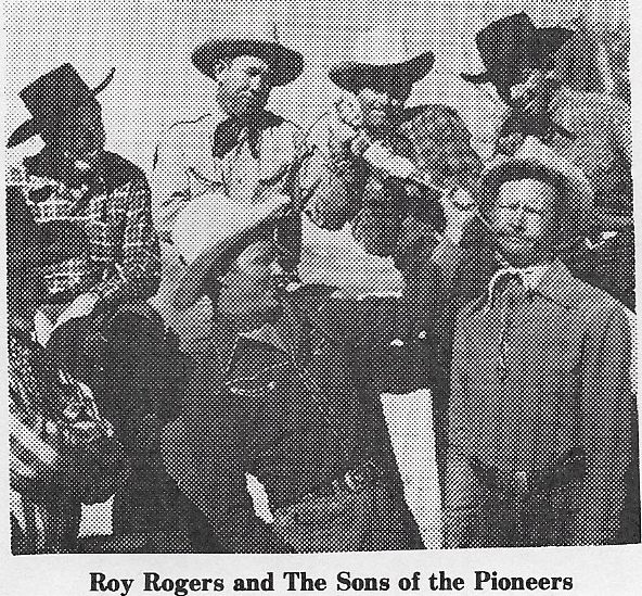 Roy Rogers, Pat Brady, Ken Carson, Hugh Farr, Karl Farr, Bob Nolan, Sons of the Pioneers, and Tim Spencer in Hands Across the Border (1944)