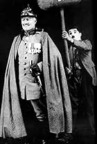 Charles Chaplin and Syd Chaplin in The Bond (1918)