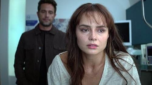 Michel Brown and Ana Lucía Domínguez in The Marked Heart (2022)