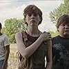 Wyatt Oleff, Jeremy Ray Taylor, Sophia Lillis, and Chosen Jacobs in It (2017)