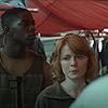 Emily Beecham and Damson Idris in Outside the Wire (2021)