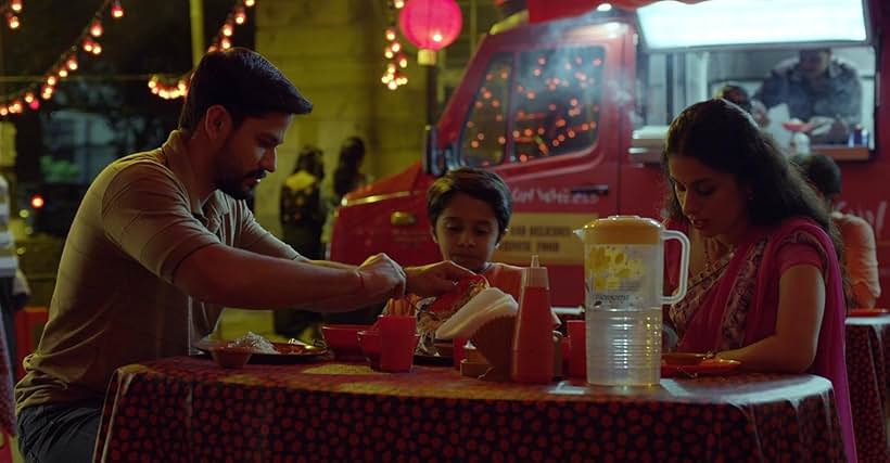 Kunal Kemmu, Rasika Dugal, and Aryan Prajapati in Lootcase (2020)