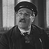 René Génin in Le quai des brumes (1938)