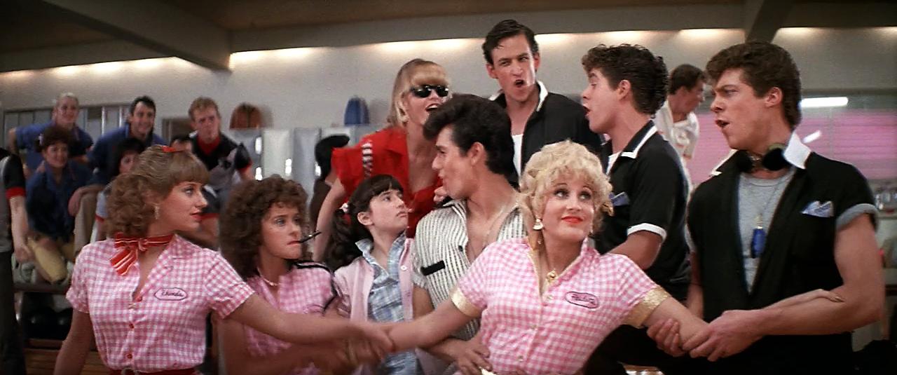 Michelle Pfeiffer, Christopher McDonald, Lorna Luft, Peter Frechette, Leif Green, Alison Price, Pamela Adlon, Maureen Teefy, and Adrian Zmed in Grease 2 (1982)