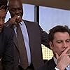 John Travolta, CCH Pounder, and Robert Wisdom in Face/Off (1997)