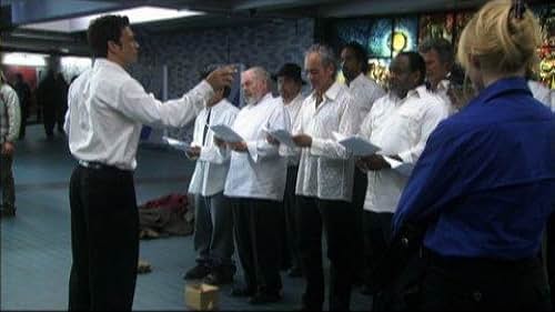 A man helps the homeless by forming a choir in this home video trailer