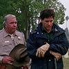 Tim Matheson and Hoyt Axton in Buried Alive (1990)