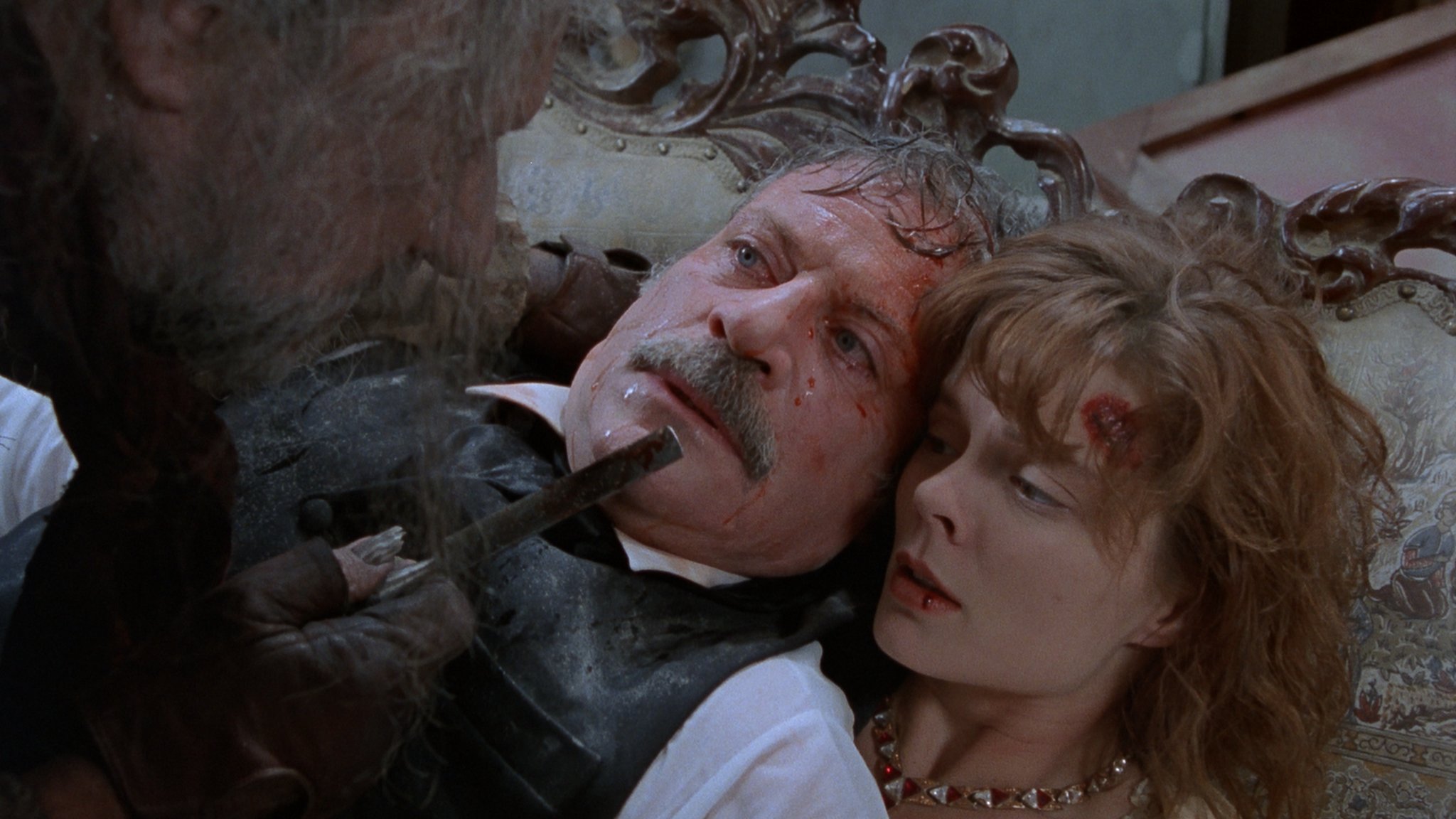 Oliver Reed and Romy Walthall in The House of Usher (1989)