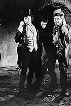 Donald Pleasence, John Cairney, Melvyn Hayes, and George Rose in The Flesh and the Fiends (1960)