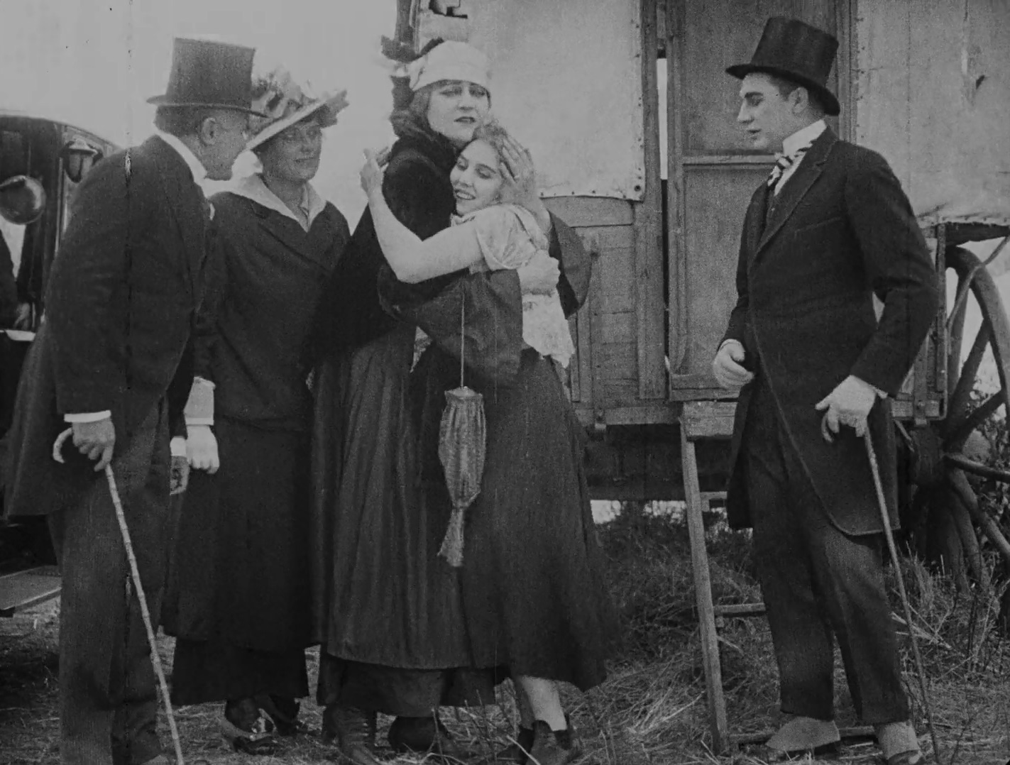 Lloyd Bacon, Charlotte Mineau, and Edna Purviance in The Vagabond (1916)